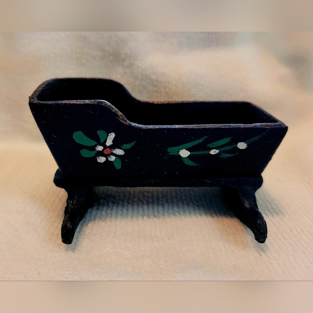 Vinatge Doll House Cast Iron Miniature Cradle with Floral Design.